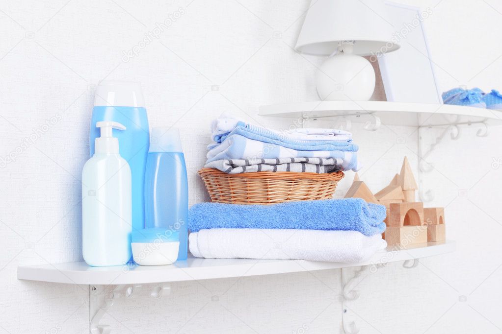 Baby accessories on shelves closeup — Stock Photo © belchonock 69491109