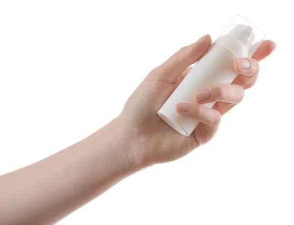 Hand with cosmetics bottle — Stock Photo, Image