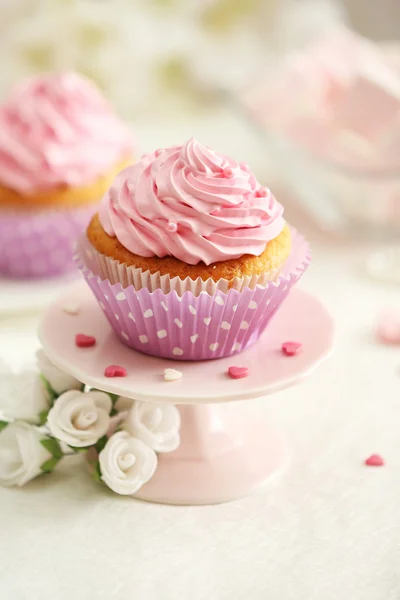 Delicious cupcakes on table  close-up — Stock Photo, Image