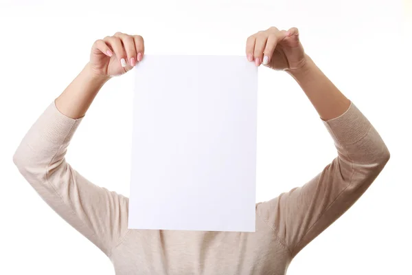 Woman covering her face with  paper — Stock Photo, Image