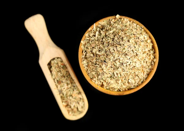 Dried parsley in wooden bowl — Stock Photo, Image