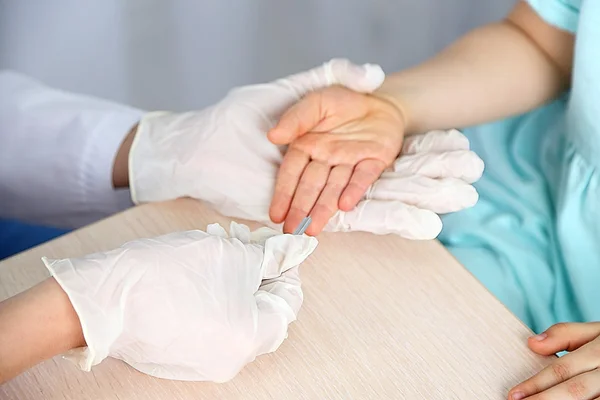 Nurse with syringe is taking blood for test in hospital — Stock Photo, Image