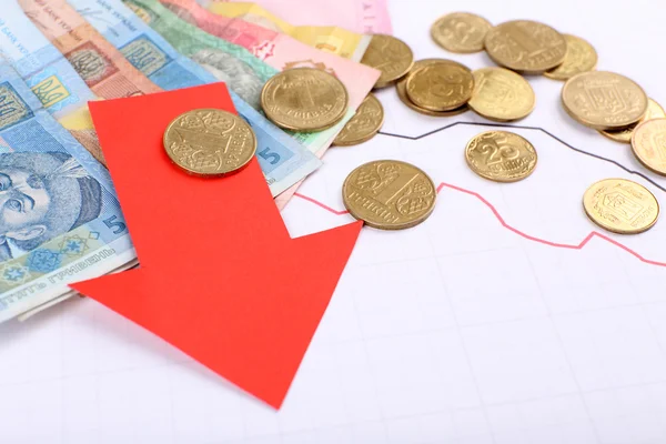 Money and red arrow on graph document close up — Stock Photo, Image