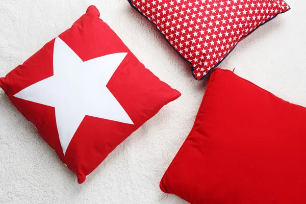 Decorative pillows on plaid close up — Stock Photo, Image