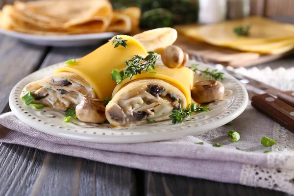 Pancakes with creamy mushrooms — Stock Photo, Image