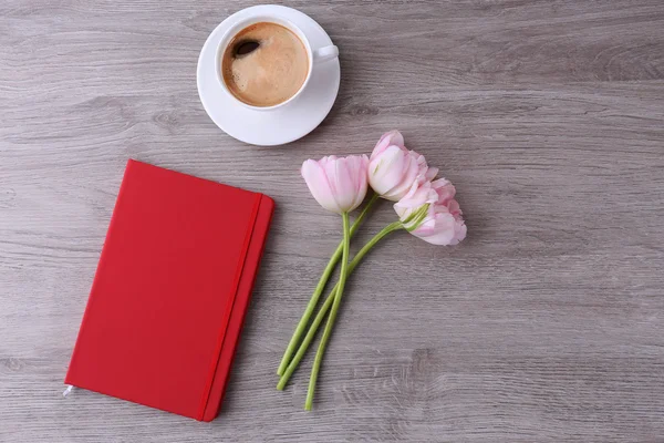 Tulips with diary and cup of coffee — Stock Photo, Image