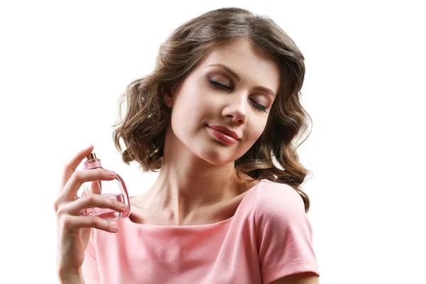 Beautiful woman with perfume bottle isolated on white — Stock Photo, Image