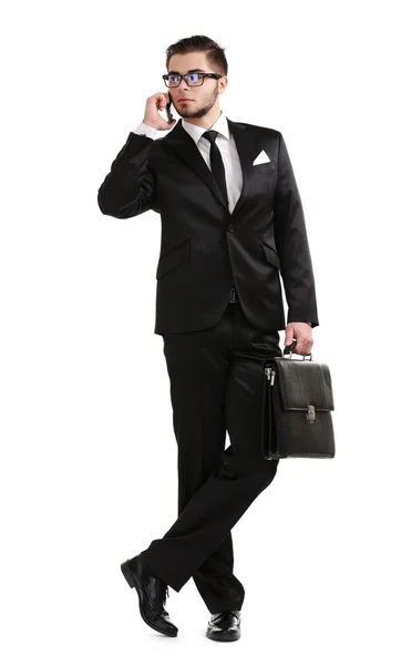 Homme élégant en costume avec téléphone portable et mallette isolée sur blanc — Photo