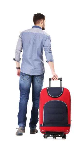Hombre de camisa azul y jeans con maleta aislada en blanco — Foto de Stock