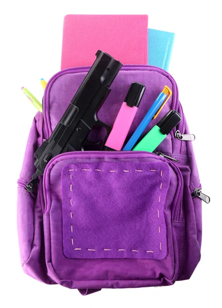 Gun in school backpack — Stock Photo, Image