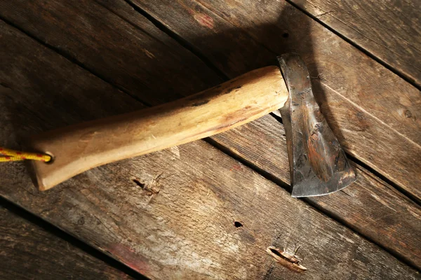 Sharp axe on wooden background — Stock Photo, Image