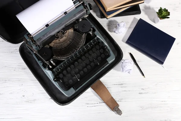 Retro typewriter on wooden table, closeup — Stock Photo, Image