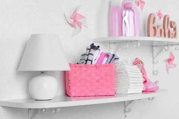 Baby accessories on shelves close-up — Stock Image Baby accessories on shelves close-up Royalty Free Stock Images