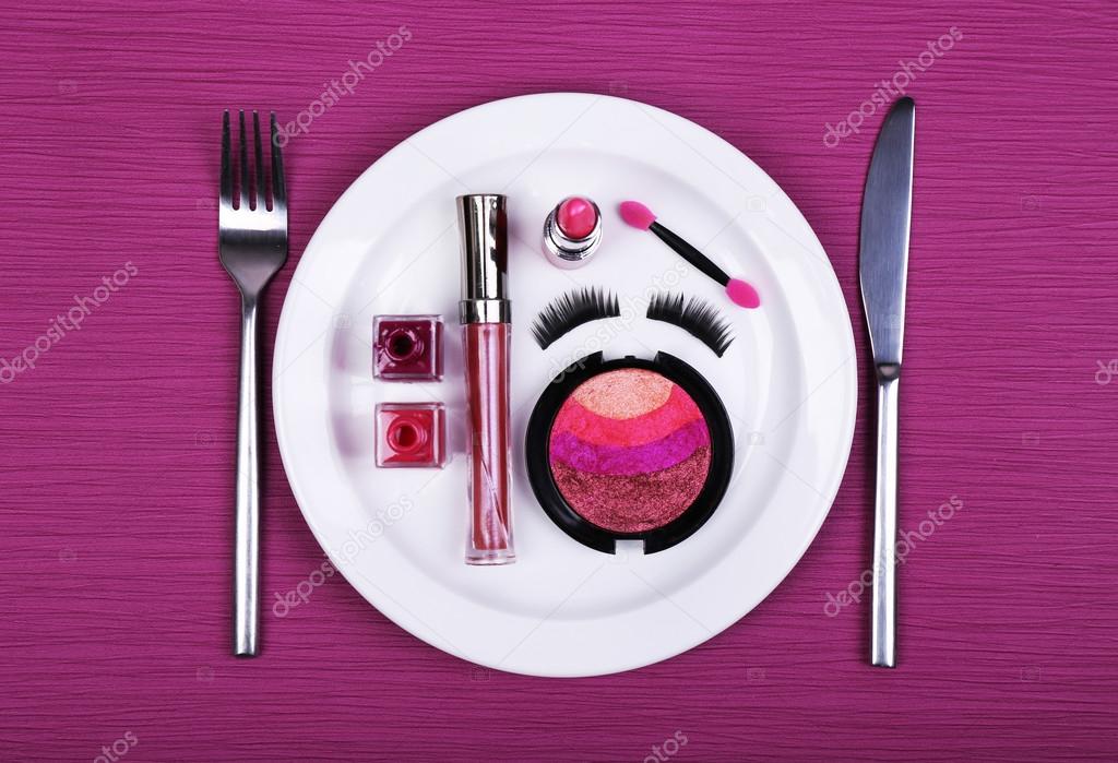 Makeup accessories on plate