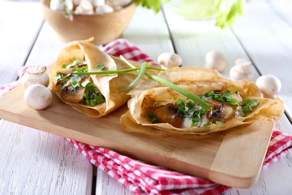 Pancakes with creamy mushrooms — Stock Photo, Image