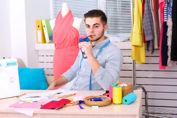 Young man fashion designer in atelier — Stock Photo, Image