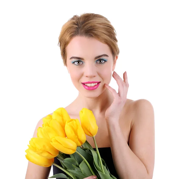 Jonge vrouw met tulpen — Stockfoto