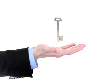 İş adamı el ile üzerine beyaz izole anahtar