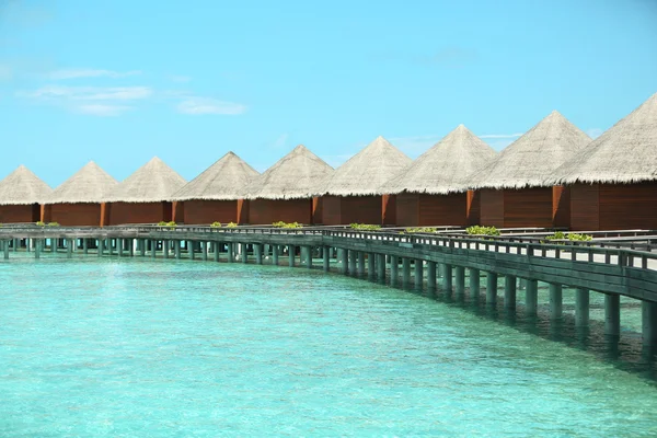 Water villa's over blauwe oceaan in baros Maldives — Stockfoto