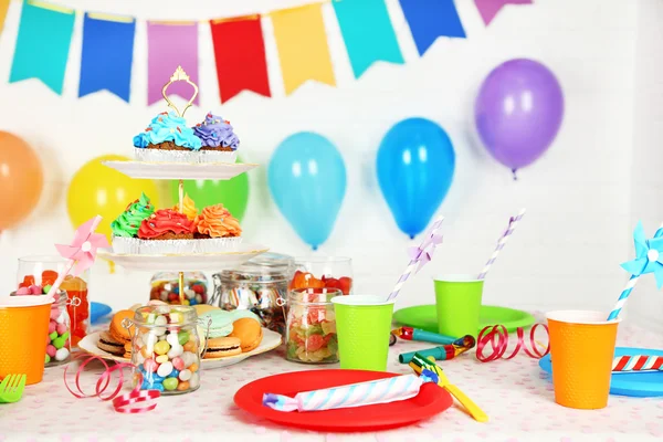 Prepared birthday table with sweets for children party