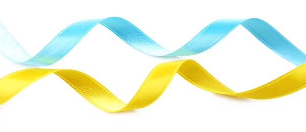 Colorful blue and yellow ribbons isolated on white — Stock Photo, Image