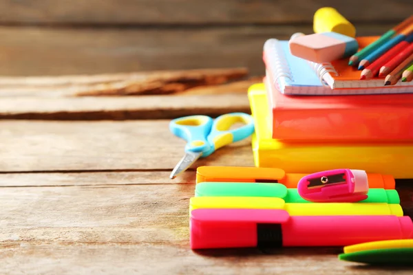 Bright school stationery on old wooden table — Stock Photo, Image