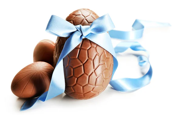 Chocolate Easter egg with color ribbon bow isolated on white — Stock Photo, Image