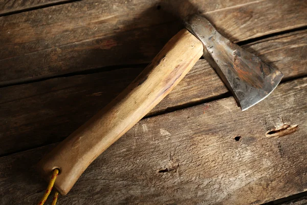 Sharp axe on wooden background — Stock Photo, Image