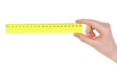 El ile plastik cetvel üzerinde beyaz izole