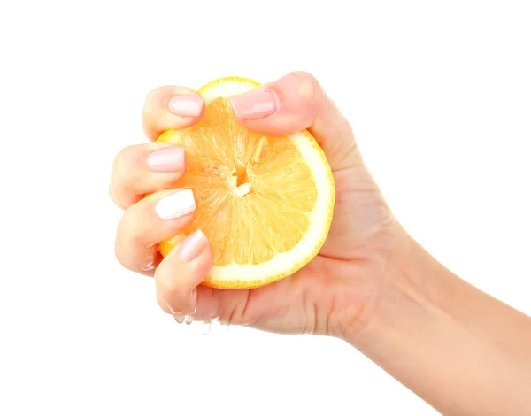 Női kéz szorította citrom elszigetelt fehér — Stock Fotó