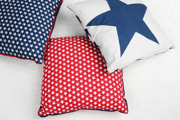 Decorative pillows on plaid close up — Stock Photo, Image