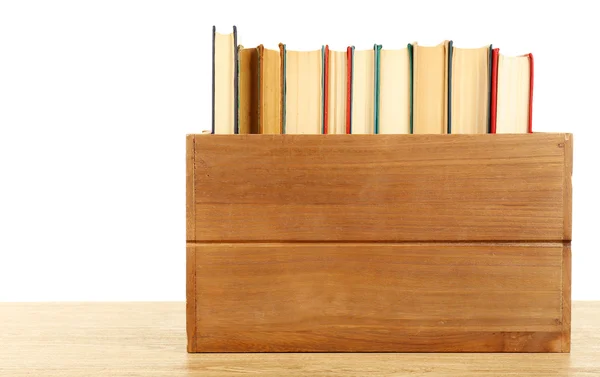Книги в дерев'яній коробці — стокове фото