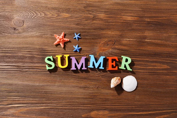 Word summer on wooden background — Stock Photo, Image