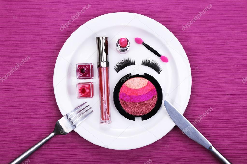 Makeup accessories on plate