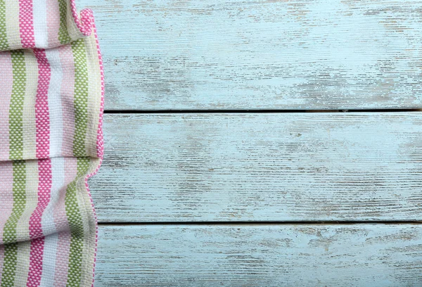 Napkin on wooden table — Stock Photo, Image