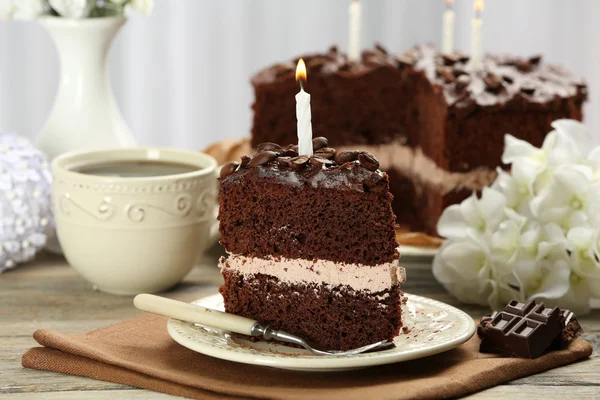 Delicious chocolate cake on table on light background — Stock Photo, Image