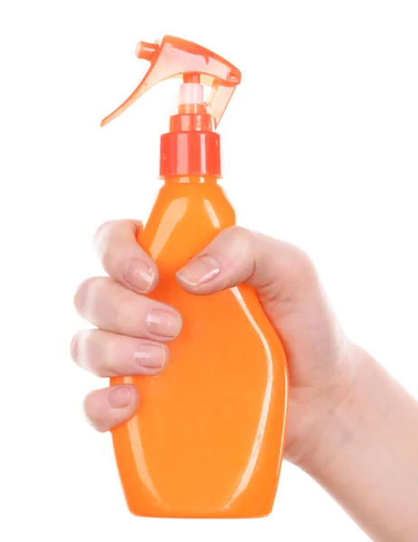 Botella de spray bronceador en mano femenina aislada sobre blanco —  Fotos de Stock