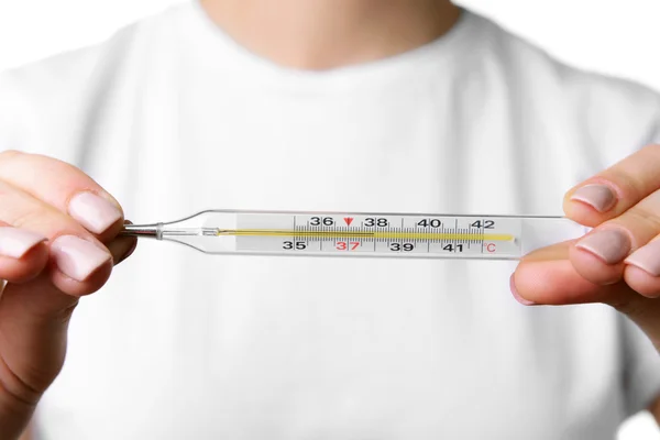 Woman holding thermometer close up — Stock Photo, Image