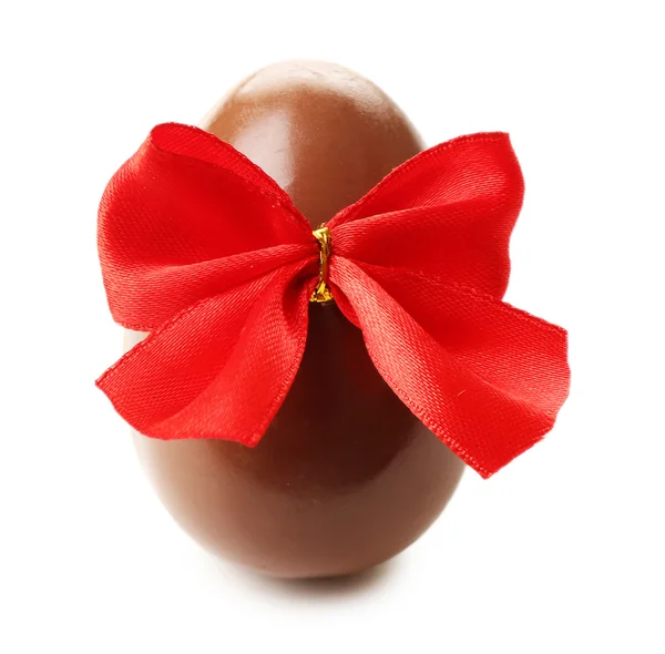 Chocolate Easter egg with color ribbon bow — Stock Photo, Image