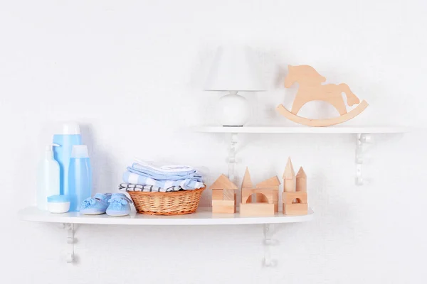 Baby accessories on shelves close-up — Stock Image Baby accessories on shelves close-up Stock Photo