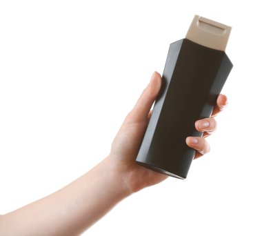 El ile üzerine beyaz izole kozmetik şişe