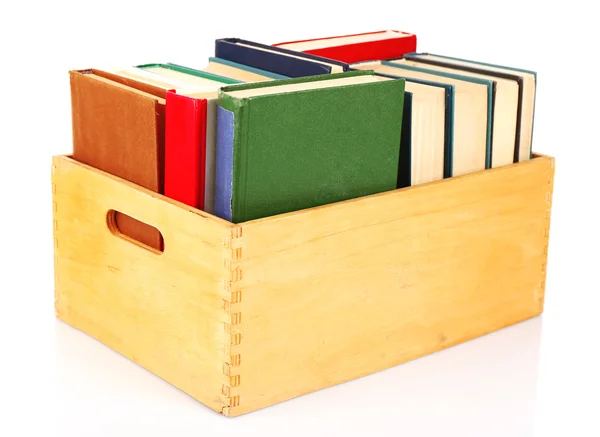 Livros em caixa de madeira isolada em branco — Fotografia de Stock