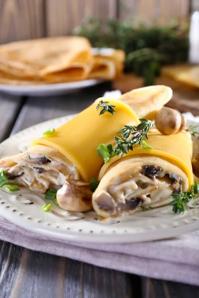 Pancakes with creamy mushrooms — Stock Photo, Image