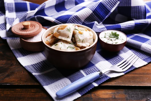 Tasty dumplings with fried onion — Stock Photo, Image