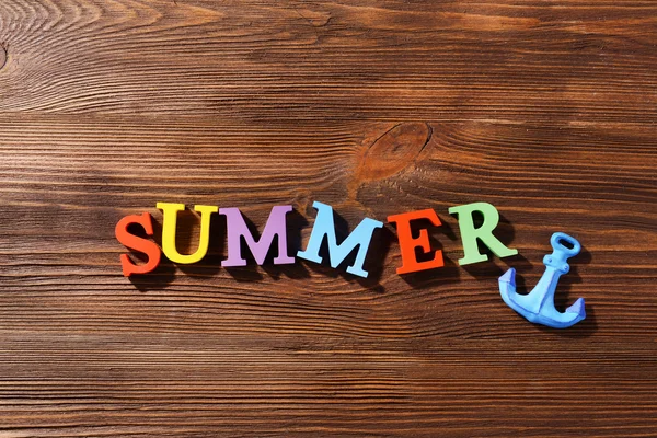 Word summer on wooden background — Stock Photo, Image