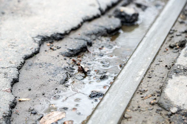 Broken asphalt close up — Stock Photo, Image