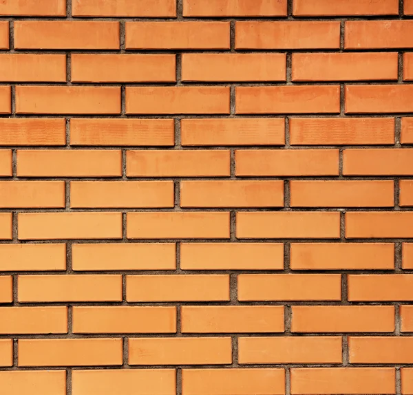 Orange Backsteinmauer Hintergrund — Stockfoto