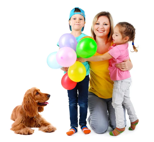 Mother with children and cute dog isolated on white — Stock Photo, Image