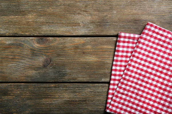 Napkin on wooden table — Stock Photo, Image