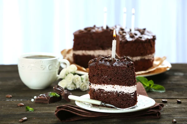 Delicious chocolate cake on table on light background — Stok Foto